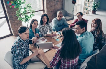 Business people on training course